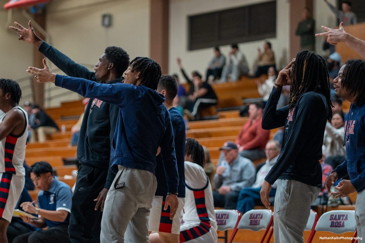 The Bear Cubs’ bench reacts to a strong late push as they come back from behind against Sac City at Haehl Pavilion on Tuesday, Jan. 14, 2025.