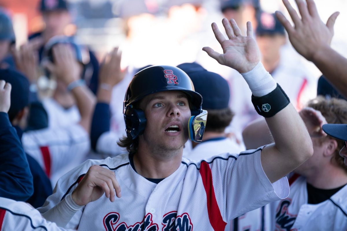 Bear Cubs catcher Mason Cox celebrates with his teammates after scoring due to a throwing error by West Valley pitcher Julian Ito on Tuesday, Jan. 28, 2025 in Santa Rosa.