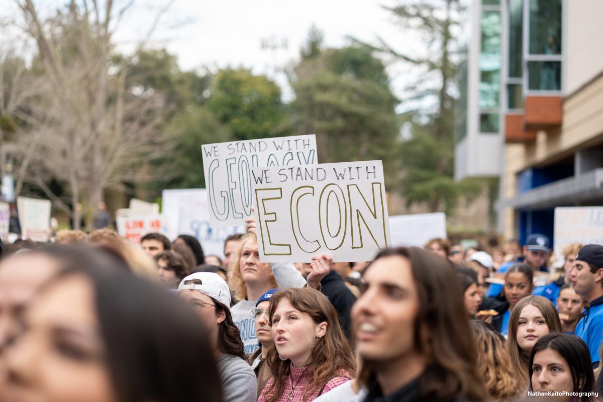 Sonoma State Univeristy's economics and geology students holds up signs in protest of budget and department cuts in Rohnert Park on Thursday, Jan. 30, 2025.