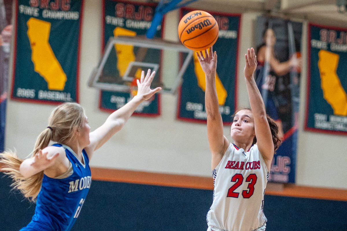 Santa Rosa's guard, Ivy Gonzalez releases a shot over her marker against Modesto at Haehl Pavilion on Friday, Jan. 17th, 2025. 