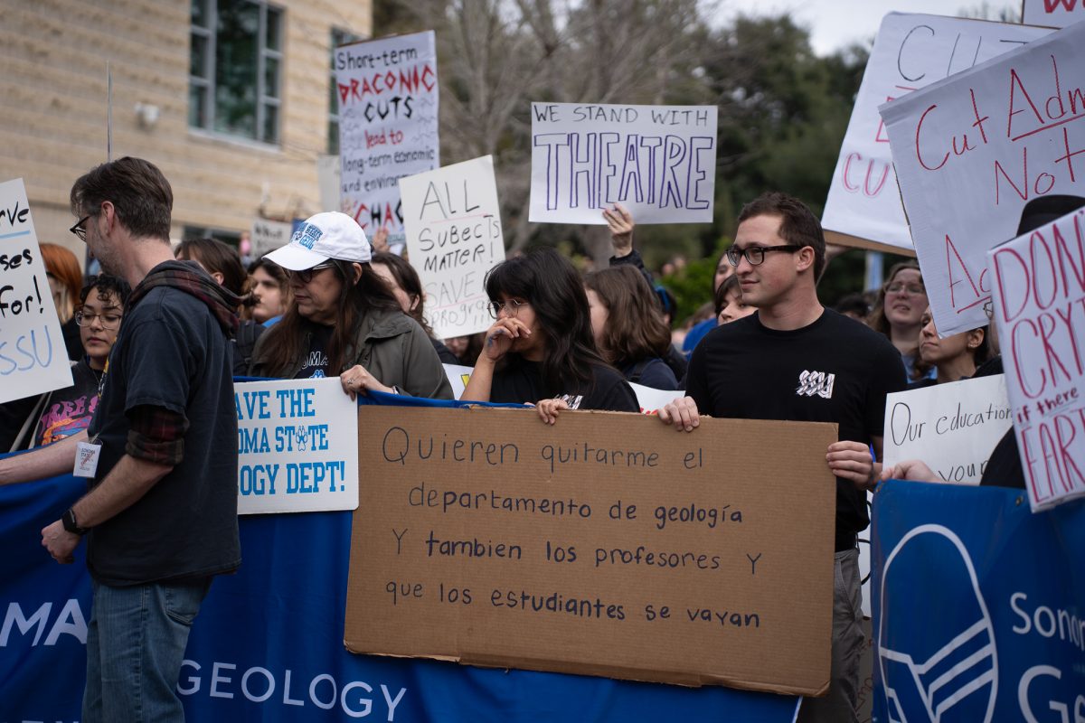 Sonoma State University students picket in Seawolf Plaza in face of budget cuts in Rohnert Park on Thursday, Jan. 30, 2025.