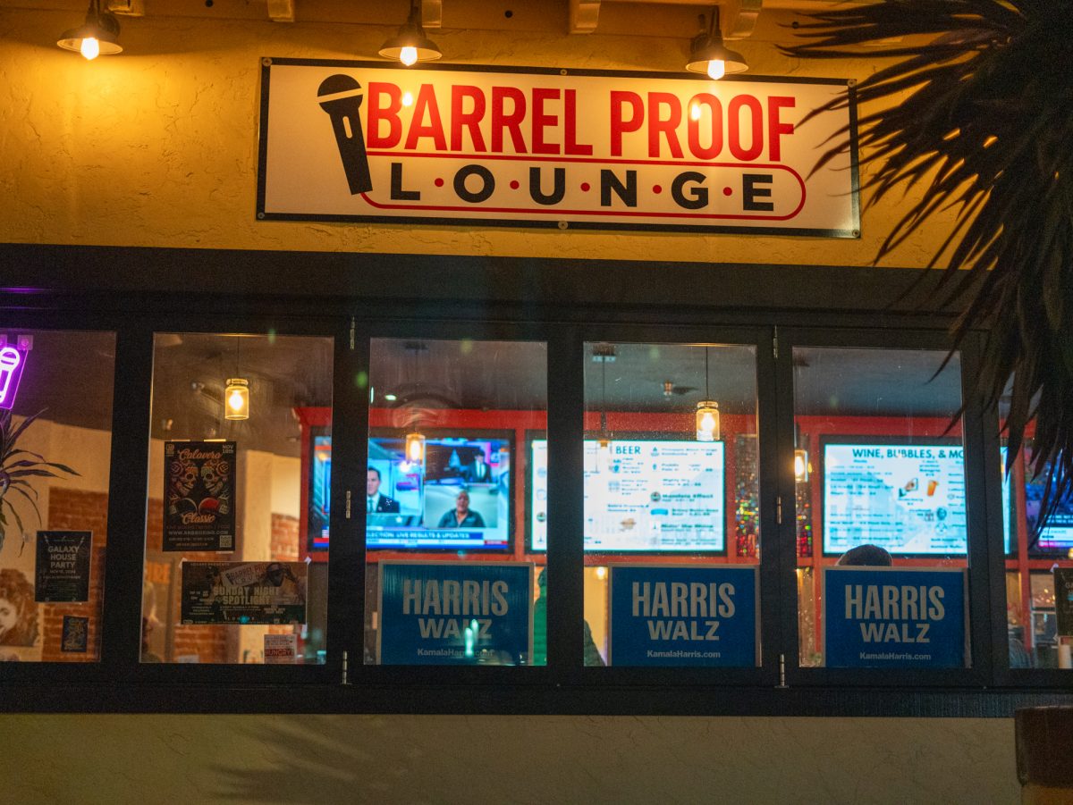 'Harris/Walz' signs on display at the Democratic watch party at Barrelproof Lounge in Santa Rosa on Tuesday, Nov. 5, 2024.