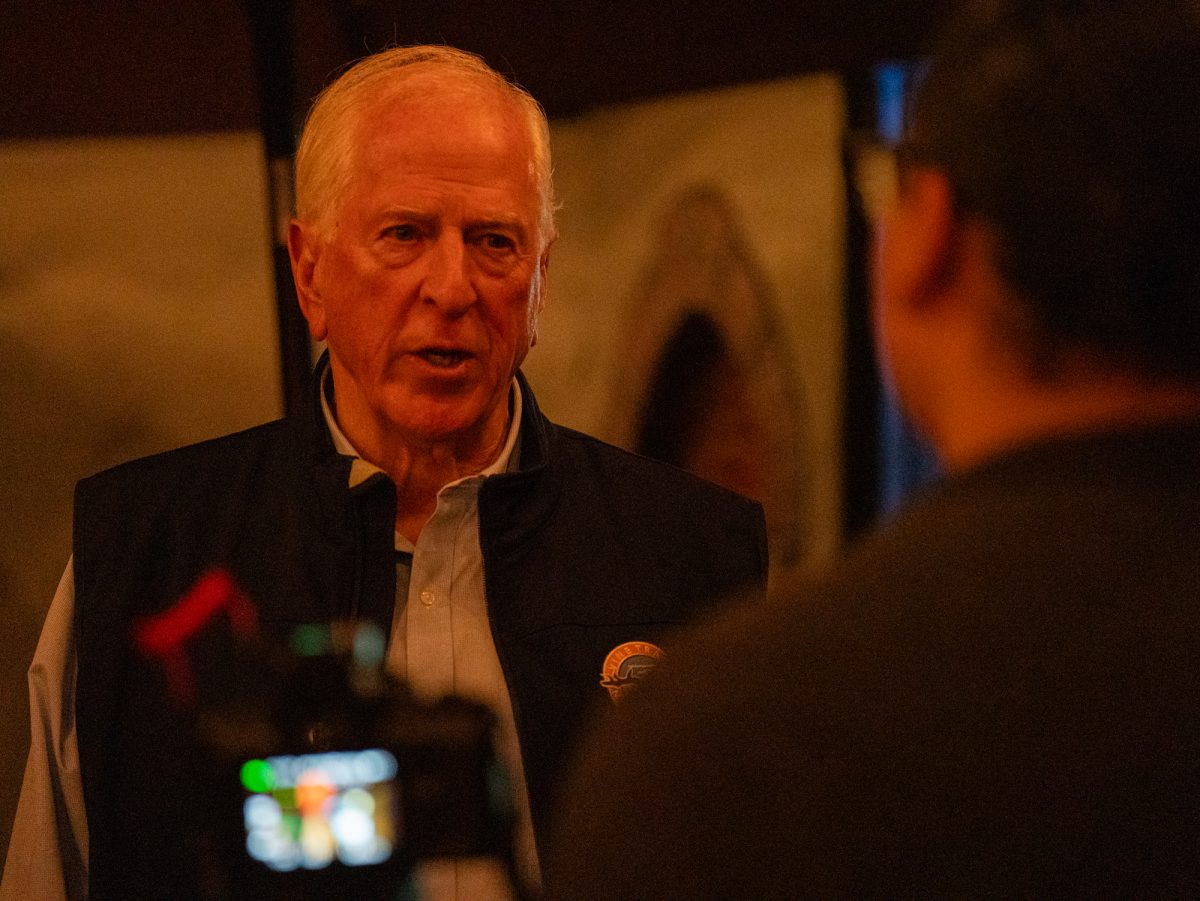 Representative Mike Thompson speaks to Oak Leaf reporter Bryan Fructuoso at the Democratic watch party at Barrelproof Lounge in Santa Rosa on Tuesday, Nov. 5, 2024.