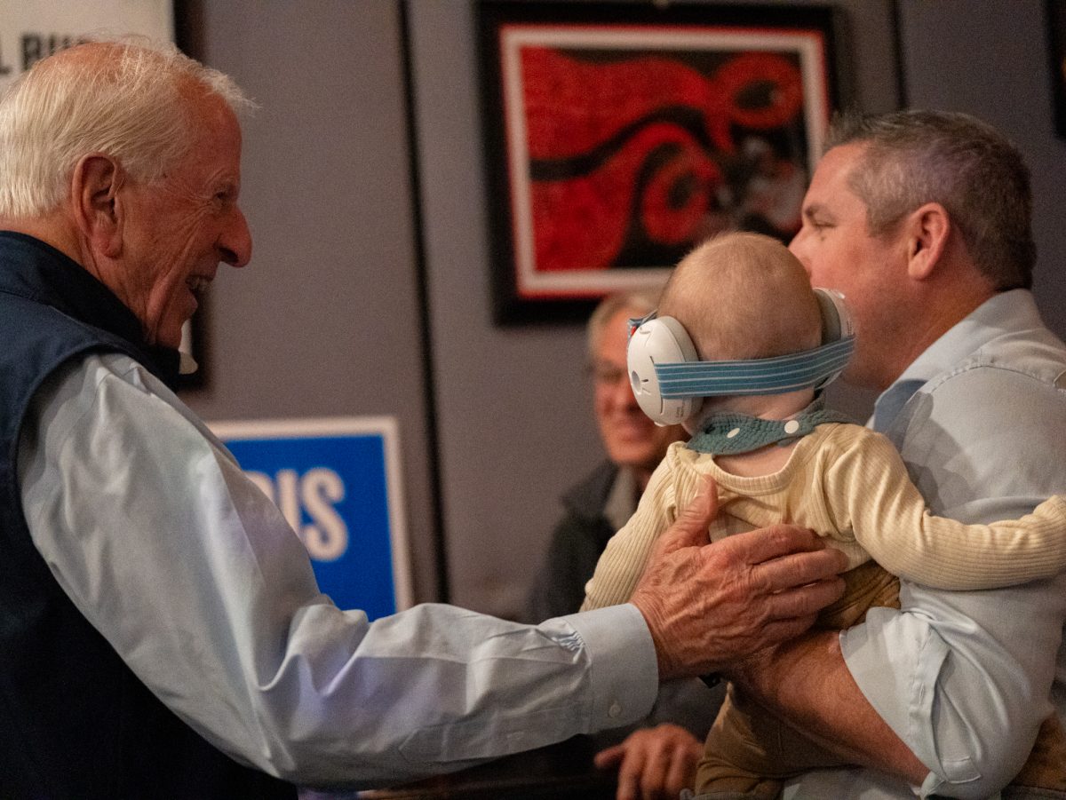 Representative Mike Thompson welcomes Assemblyman Chris Rogers and his daughter to the Democratic watch party at Barrelproof Lounge in Santa Rosa on Tuesday, Nov. 5, 2024.