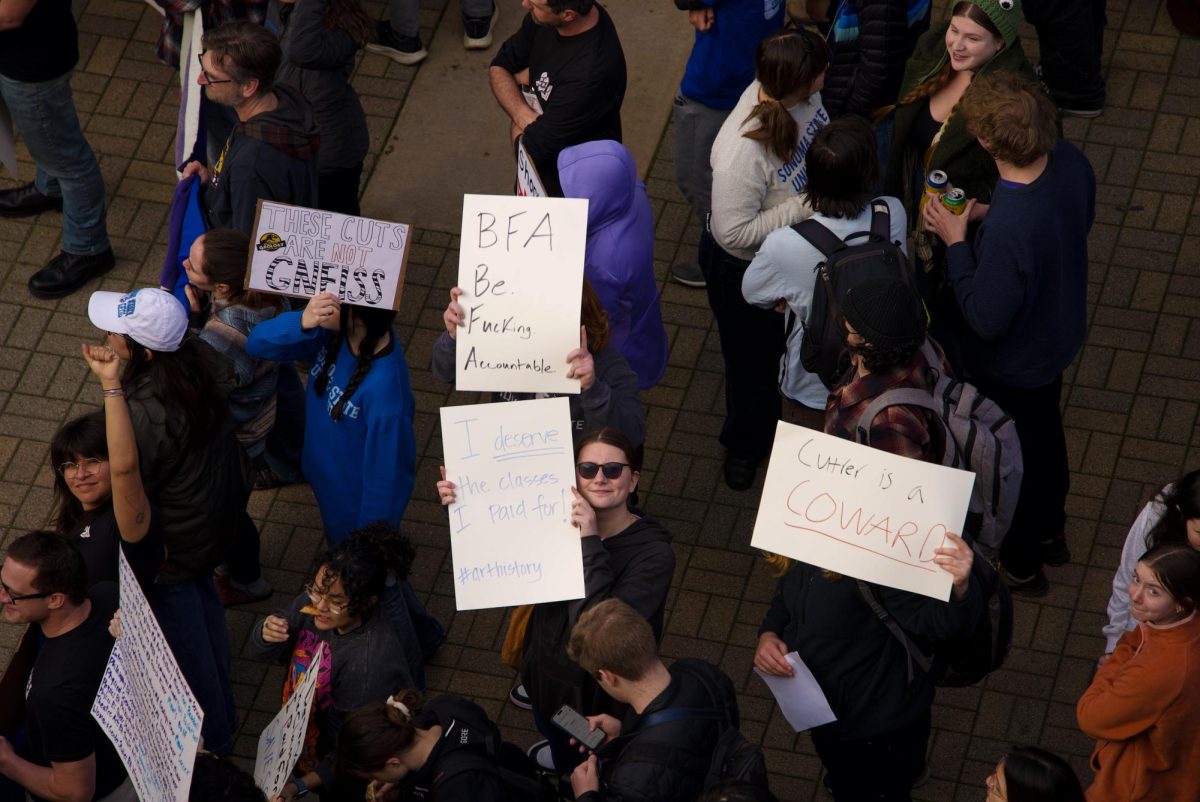 Sonoma State arts and geology students rallied against the impending budget cuts in Seawolf Plaza at Sonoma State University on Thursday, Jan. 30, 2025. 