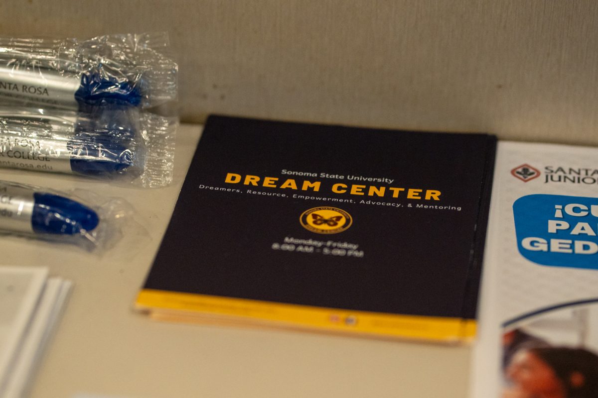 Flyers advertising Sonoma State University's Dream Center is on display for students to take 