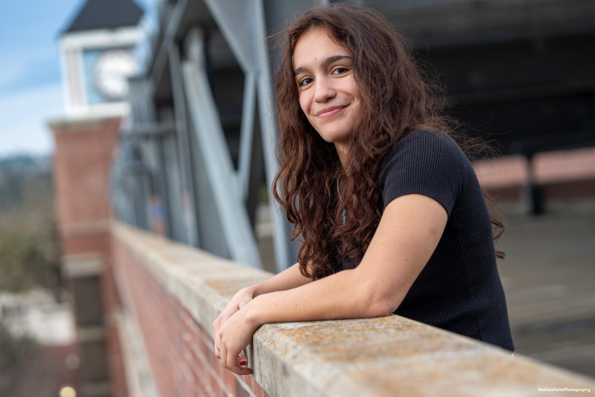 SRJC's guard Ivy Gonzalez looks down at Bailey Field from the top floor of Zumwalt Parking Pavilion on Saturday, Feb. 22, 2025.