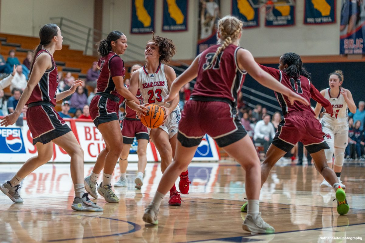 Bear Cubs' guard Ivy Gonzalez tries to go for a layup while surrounded by Sierra's starting five at Haehl Pavilion on Jan. 11, 2025.