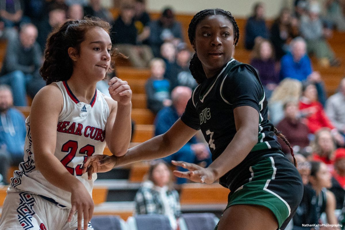 Bear Cubs' guard Ivy Gonzalez makes a pass into the paint during the early exchanges against Diablo Valley at Haehl Pavilion on Jan. 4, 2025.