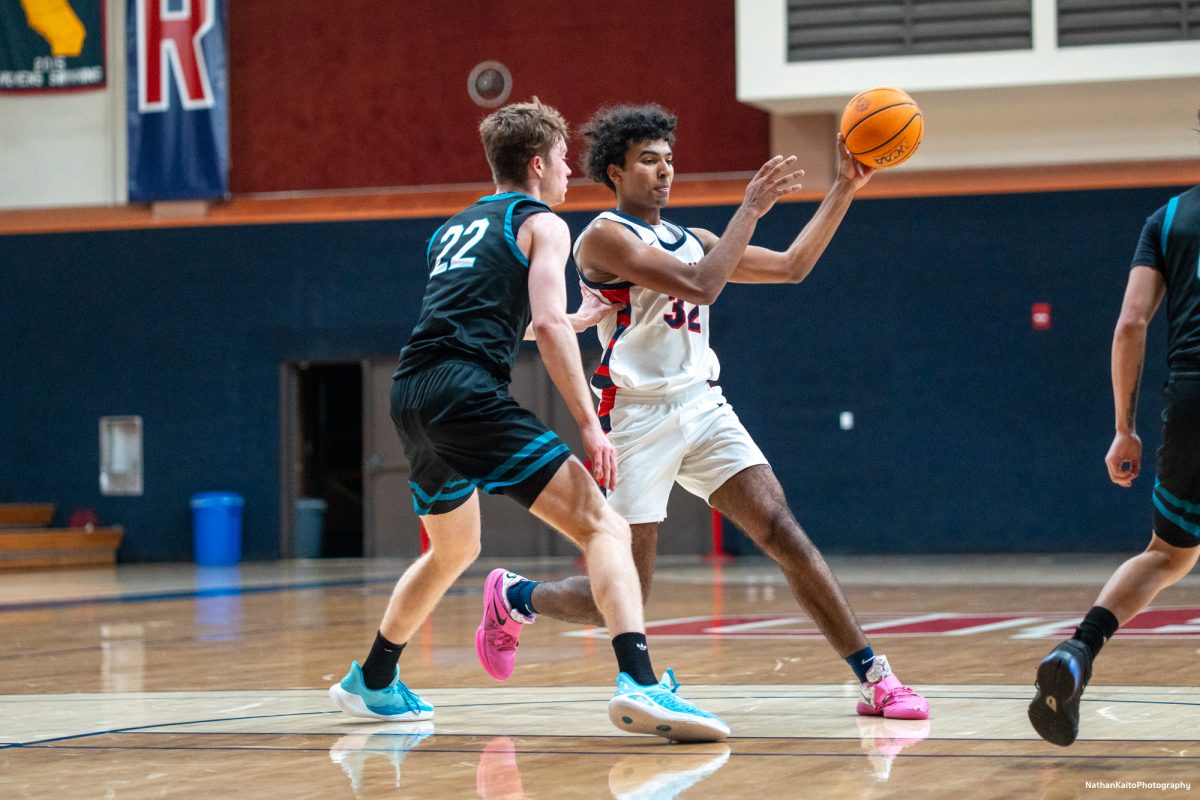 INLINE: SRJC' forward Jaden Washington passes the ball as the Bear Cubs build their attack against Folsom Lake at Haehl Pavilion on Friday, Feb. 14, 2025.  