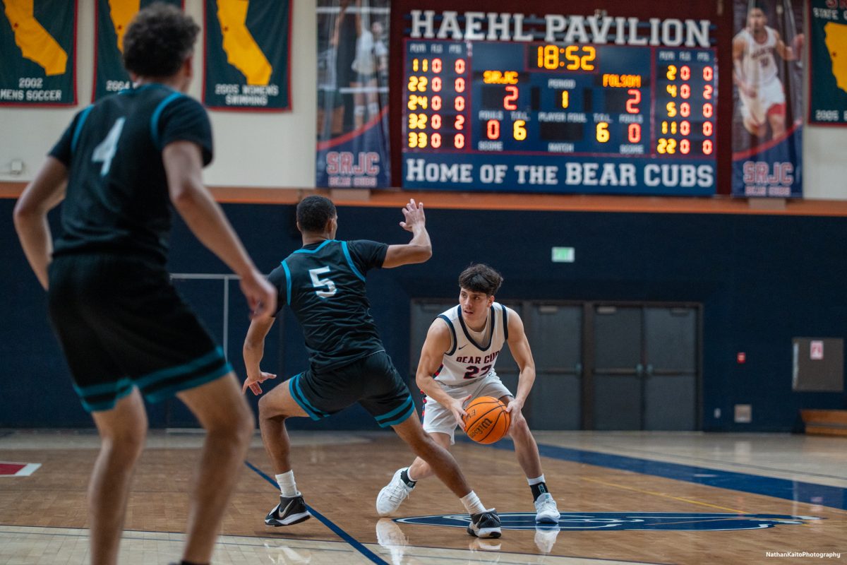 Cover?: Bear Cubs' guard Andrew Pengel squares up with Folsom Lake's Micah Hobson at Haehl Pavilion on Friday, Feb. 14, 2025. 