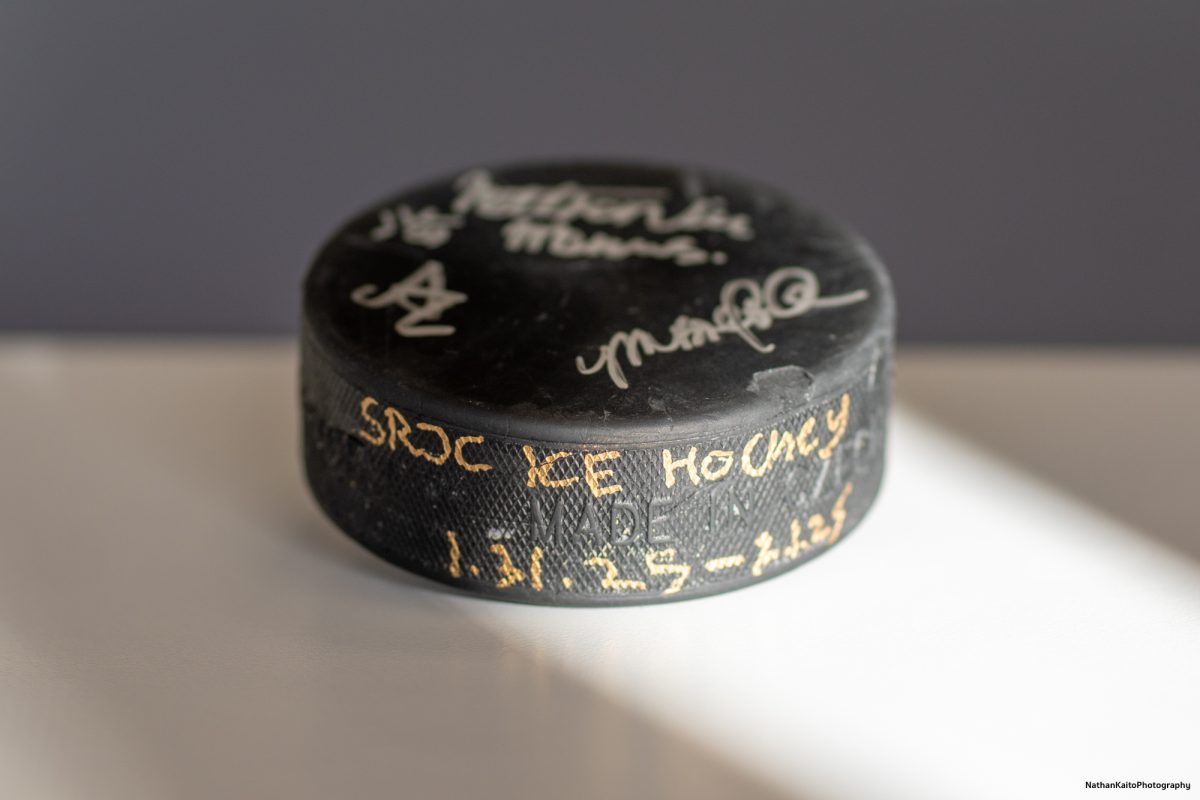 A game used ice hockey puck signed by Oak Leaf reporters, Adair Alvarez Rodriguez, Nathan Kaito Morris, and Yna Bollock serves as a sweet souvenir from the Polar Bears' games against Fresno at Snoopy's Home Ice on Jan. 31, and Feb. 1, 2025