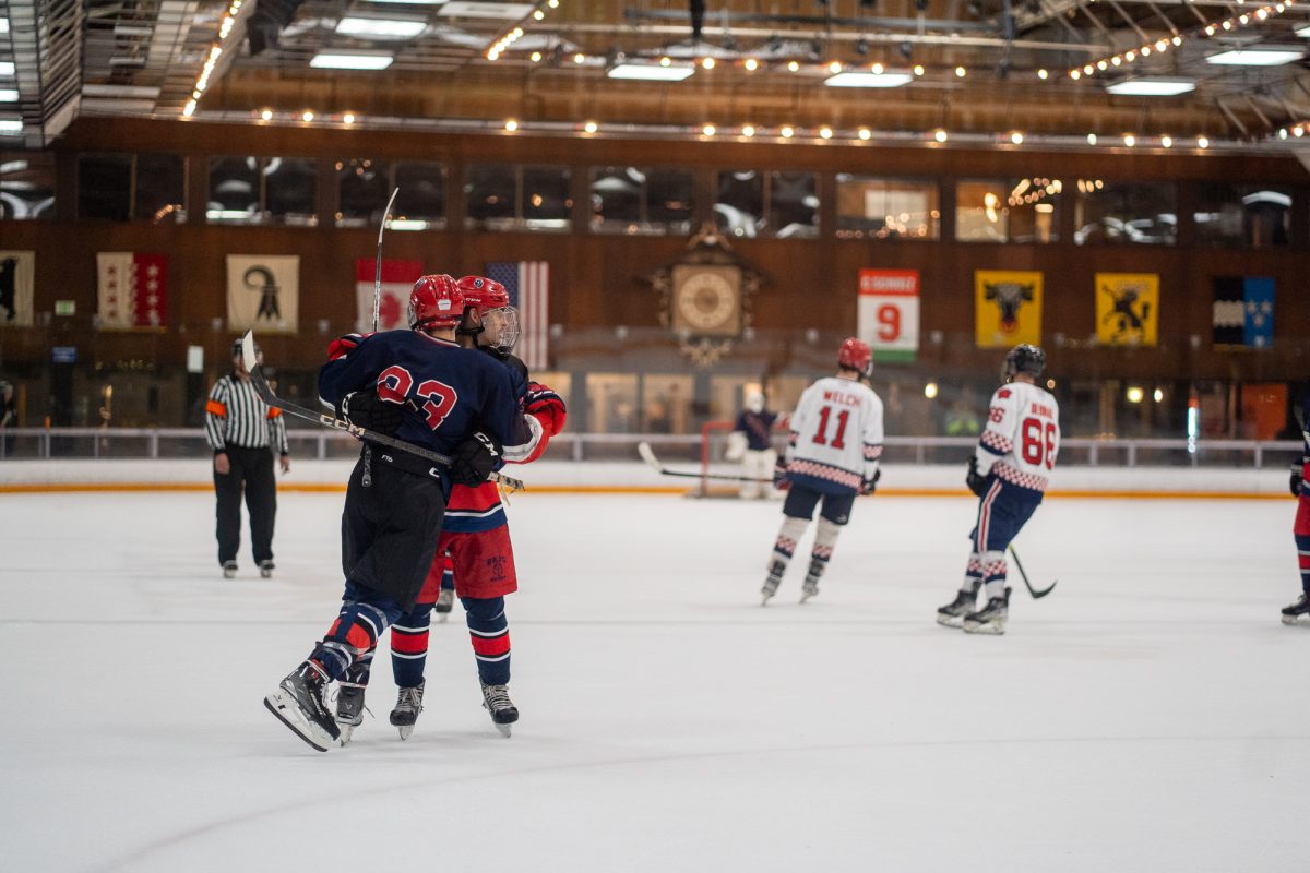 Polar Bears forward Roy Scott, left, embraces forward Antonio Hernandez, right, after a goal against Fresno State at Snoopy's Home Ice on Saturday, Feb. 1, 2025.