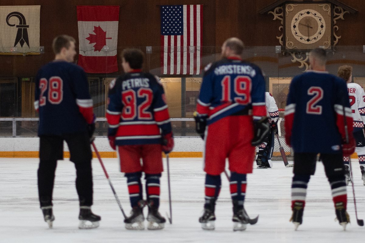 The Polar Bears' starters stand for the national anthem before their match against Fresno State at Snoopy's Home Ice on Saturday, Feb. 1, 2025.