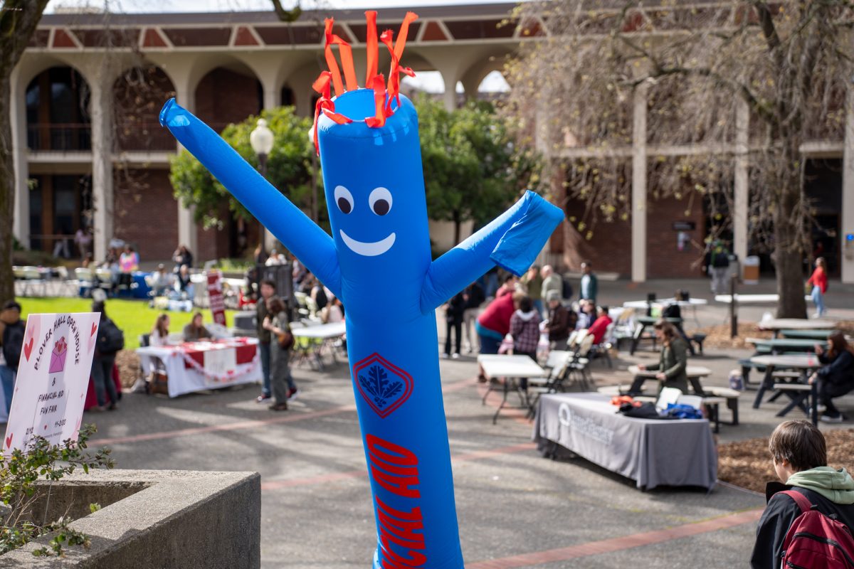 An inflatable-tube-man waves around at the financial aid fun fair outside of Plover Hall on Wednesday, Feb. 12, 2025.