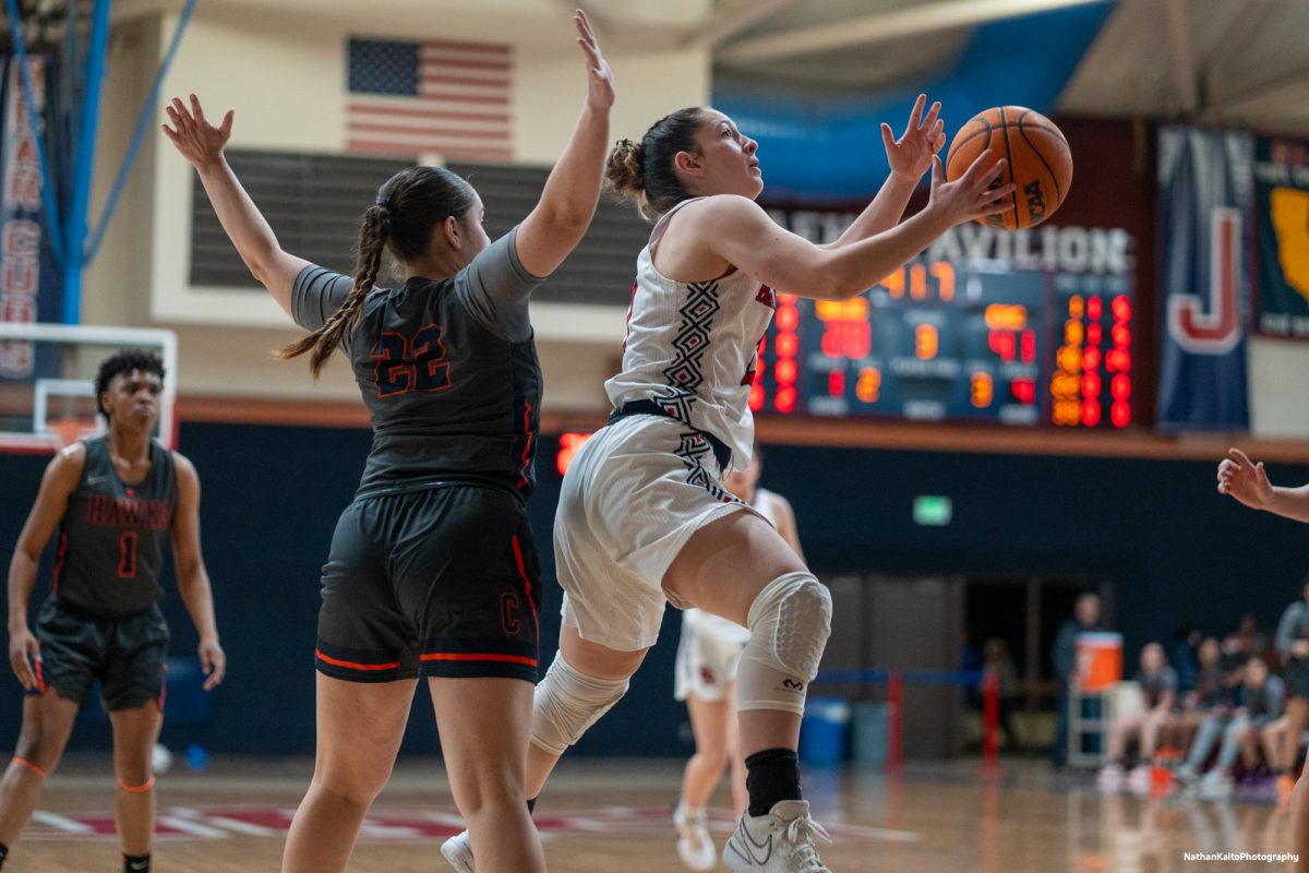 Bear Cubs guard Hailey Webb surges past Cosumnes River forward Jasmine Heard for a layup at Haehl Paviliion on Friday, Feb. 7, 2025. 