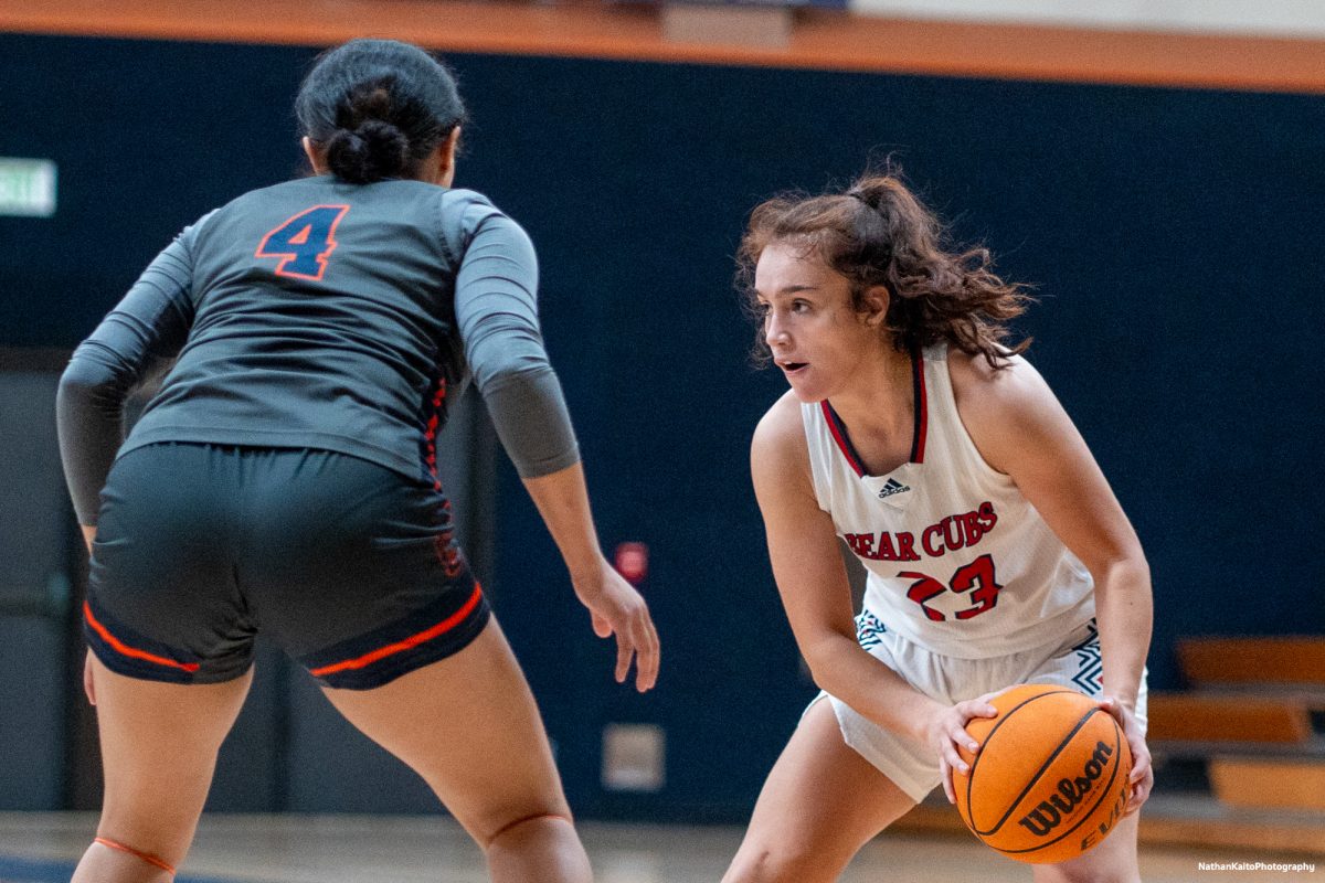 Bear Cubs guard Ivy Gonzalez sizes up Hawks guard Antonia Gutierrez-Cathey at Haehl Pavilion on Friday, Feb. 7, 2025.