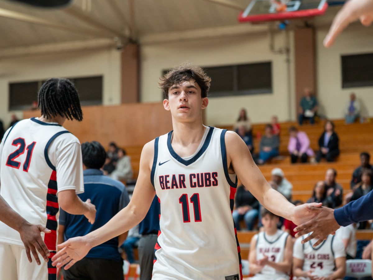 Freshman guard Spencer Langowski walks down for lineup ahead of the game against American River at home on Friday, Feb. 21, 2025.