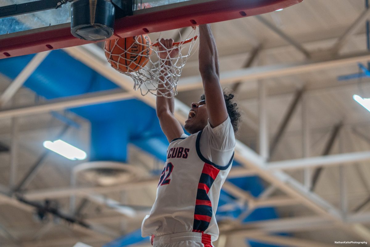 SRJC forward Jaden Washington yells as he dunks powerfully against Yuba on Saturday, Mar. 1, 2025 at Haehl Pavilion.  