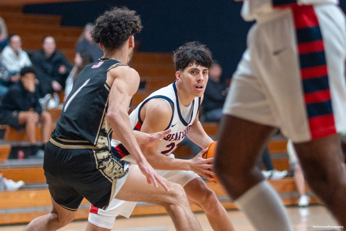 SRJC guard Andrew Pengel holds off the Miner's Devan Minouei as he looks to build an attack against Yuba on Saturday, Mar. 1, 2025 at Haehl Pavilion.  