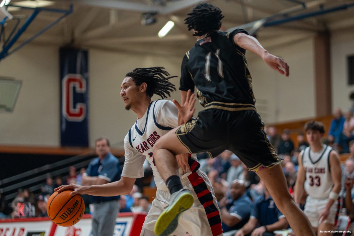 Bear Cubs' forward Tayden Collins pump-fakes the Miner's Taye Hollins against Yuba on Saturday, Mar. 1, 2025 at Haehl Pavilion.  