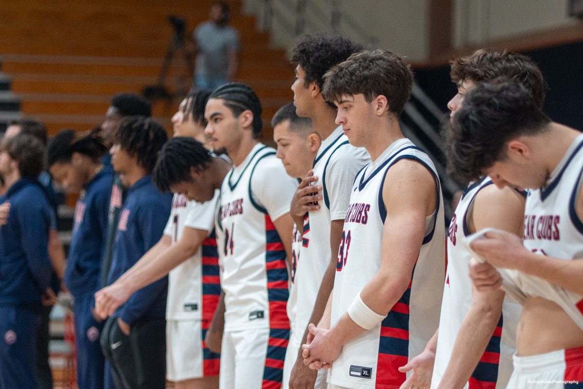 The SRJC Bear Cubs stand somberly as the National Anthem rings around Haehl Pavilion prior to their game against Yuba on Saturday, Mar. 1, 2025. 