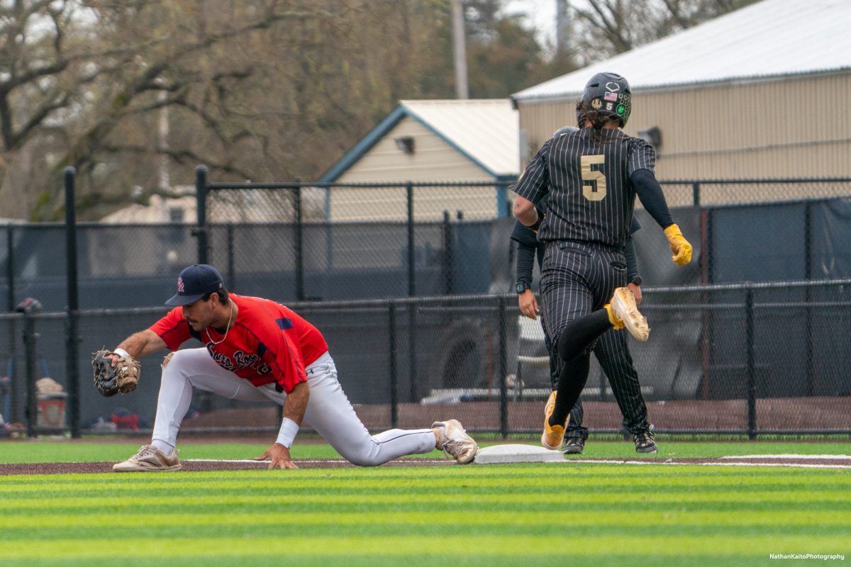 Santa Rosa Junior College first baseman Josh Martin catches the ball to record an out on San Joaquin Delta shortstop Pham Derek, who sprints toward the base on Saturday, March 15, 2025, in Santa Rosa.