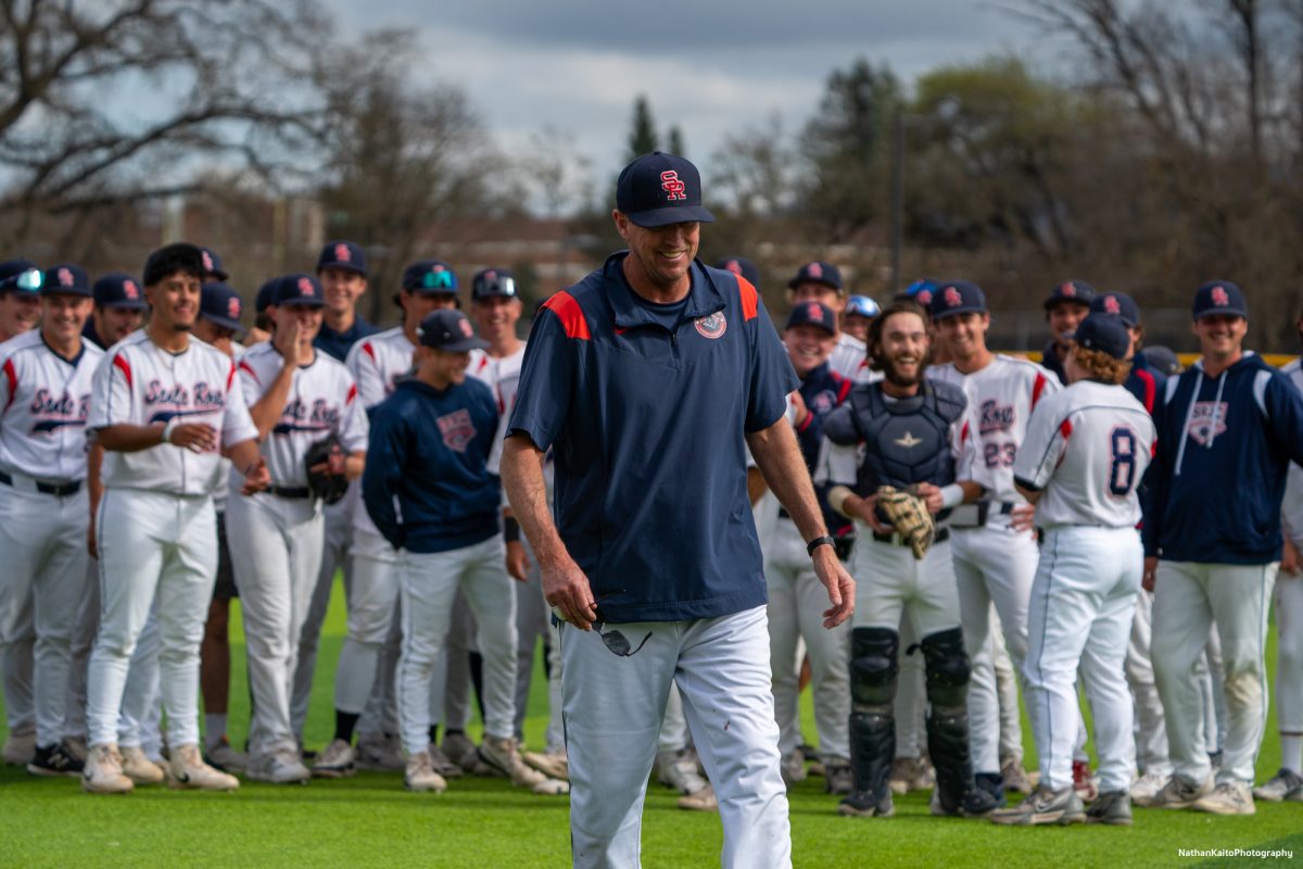 Bear Cubs head coach Damon Neidlinger is all smiles after his team sings "Happy Birthday" to him following their win against San Joaquin Delta on Tuesday, March 11, 2025 in Santa Rosa.