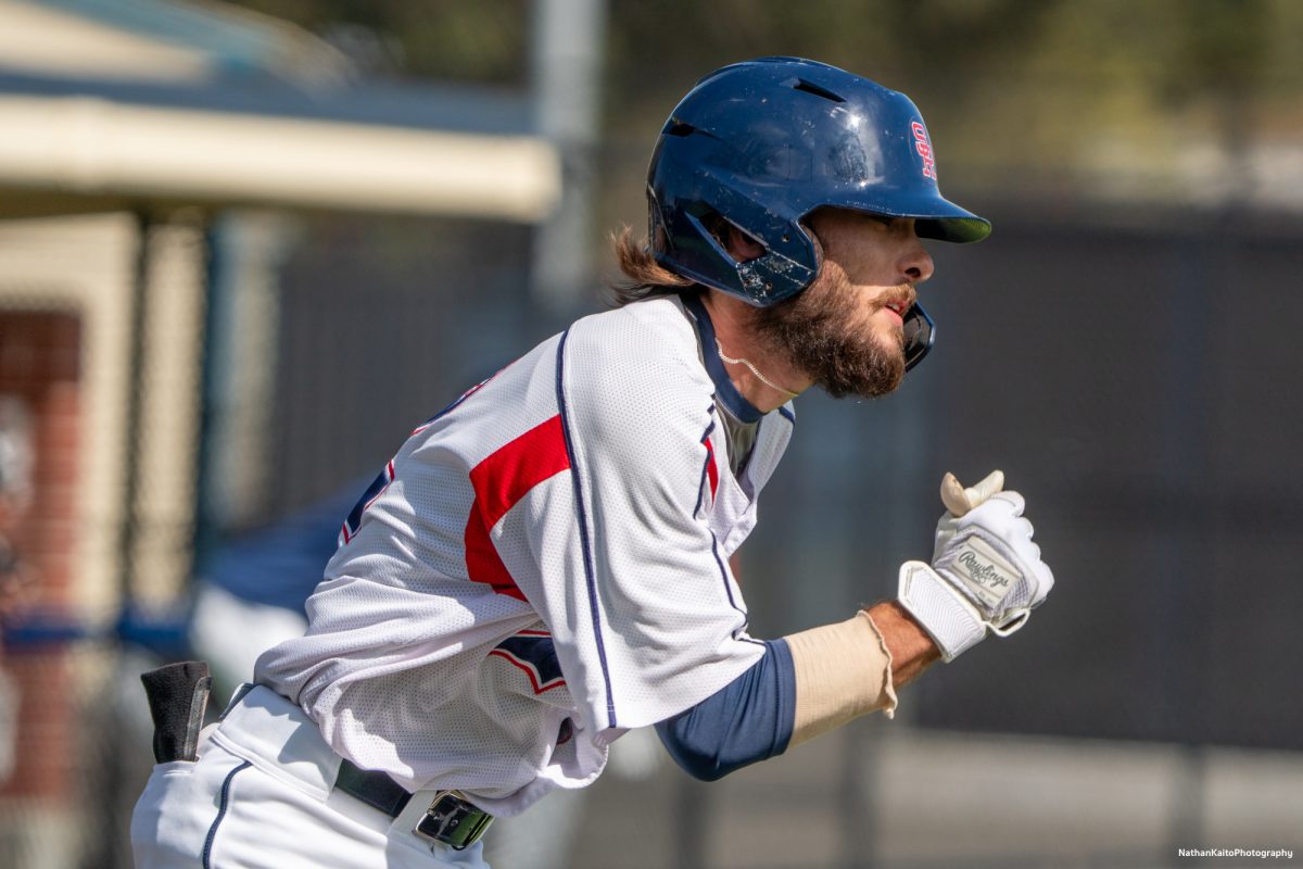 Santa Rosa Junior College's catcher Cameron Duran sprints to first base after hitting a line drive against San Joaquin Delta on Tuesday, March 11, 2025 in Santa Rosa.