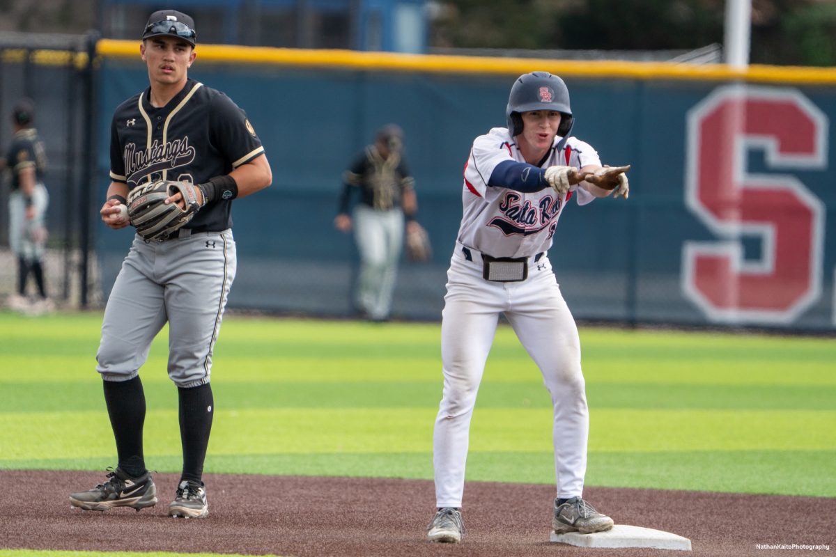 Santa Rosa Junior College's outfielder Ayden Herrguth celebrates towards the bench after making it to second base during the early exchanges against San Joaquin Delta on Tuesday, March 11, 2025 in Santa Rosa.