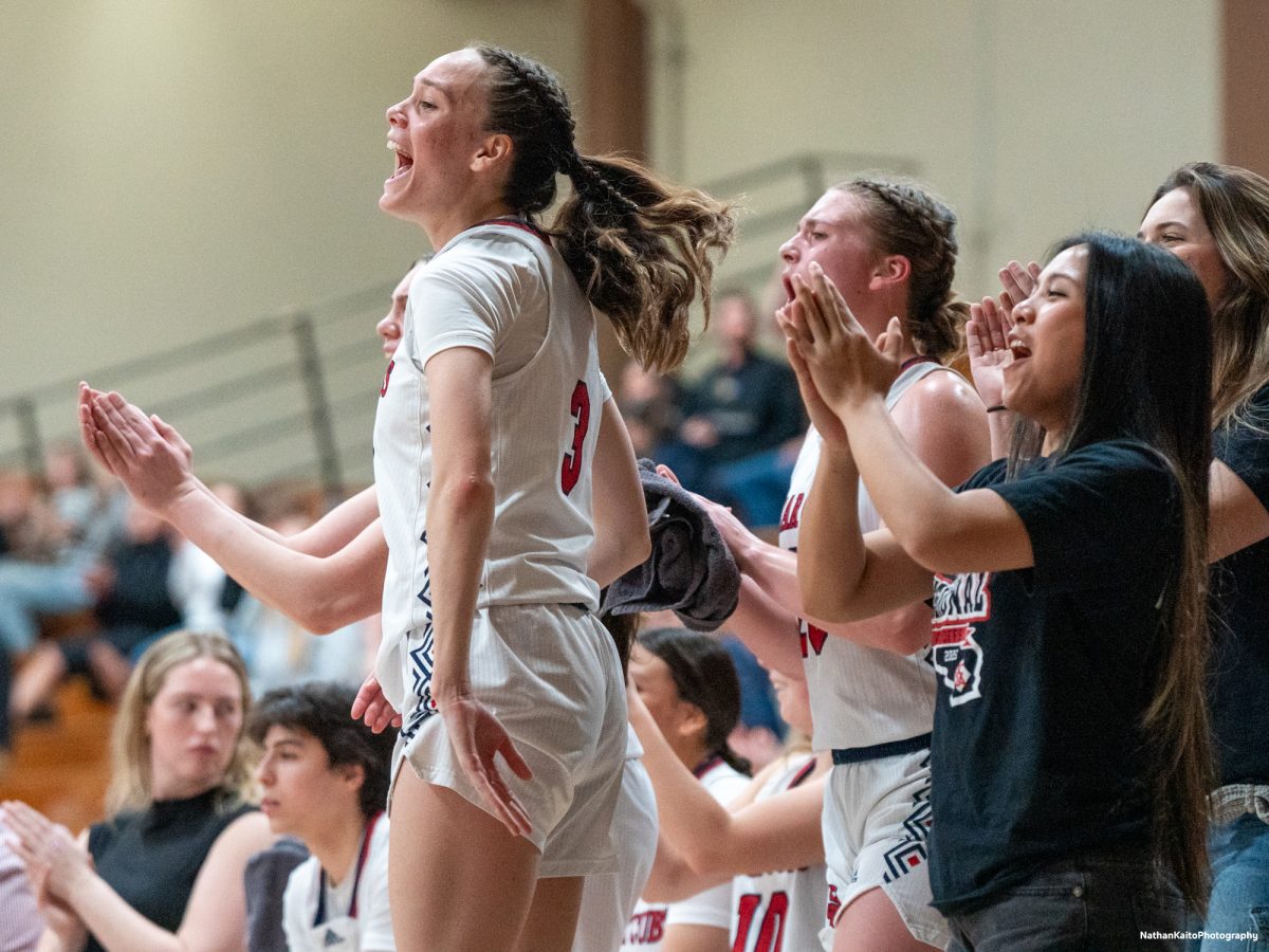 SRJC's bench celebrates wildly as Bear Cubs' guard Caitlin Baldwin scores a tidy lay up against the College of the Redwoods on Wednesday, Feb 26, 2025 at Haehl Pavilion.