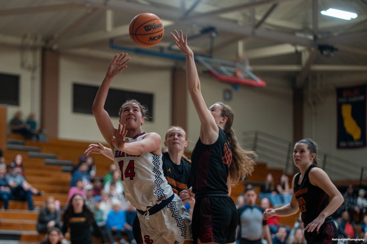 Bear Cubs' forward Kaia Eubanks lunges herself forward as she goes for a layup against the College of the Redwoods on Wednesday, Feb. 26, 2025 at Haehl Pavilion.