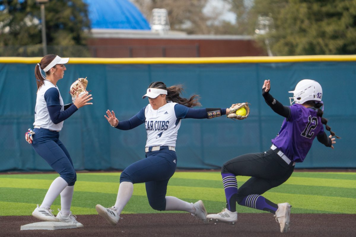 Bear Cubs' infielder Niueni Elisara dives for second base, just beating the Falcon's batter Marianna Prieto at Marv Mayes Softball Field on Tuesday, Mar. 4, 2025. 