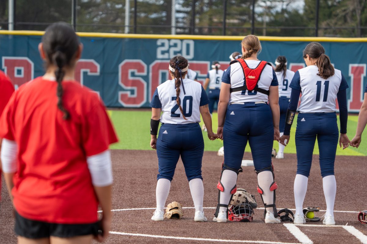 The Bear Cubs stand somberly as the National Anthem rings out at Marv Mayes Softball Field before the game against Folsom Lake on Tuesday, Mar. 4, 2025. 