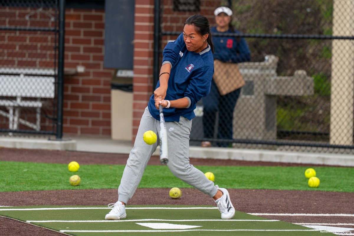 Assistant coach Anna Zoia-Buescher participates in the SRJC Softball Alumni Home Run Derby on Saturday, March 15, 2025 in Santa Rosa.